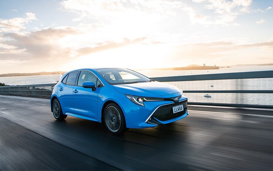 Toyota Corolla ZR Hybrid driving across Harbour Bridge in Auckland