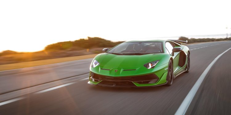 Lamborghini Aventador SVJ driving along road