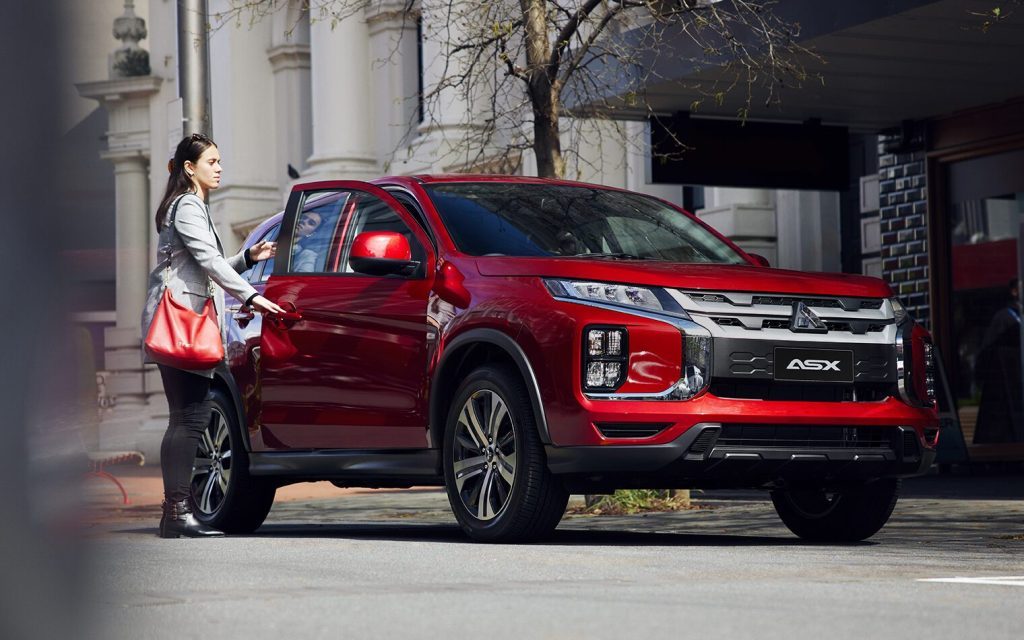 Mitsubishi ASX with lady opening door