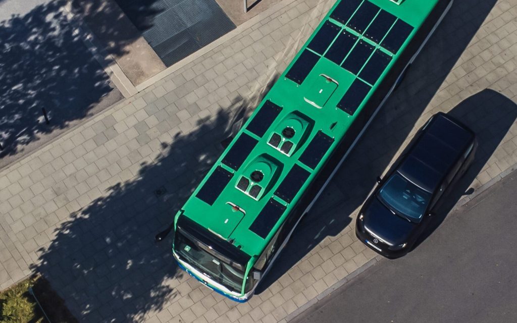 Sono Sion solar powered electric vehicle (SEV) with solar powered bus top view