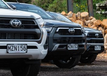 Row of Toyota Hiluxes in forest