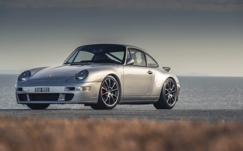 Paul Stephens Autoart Porsche 993R front three quarter view by ocean