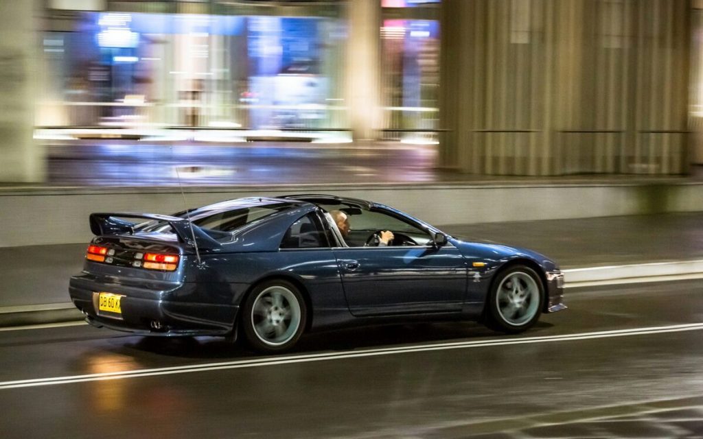 Nissan 300ZX rear three quarter view driving at night