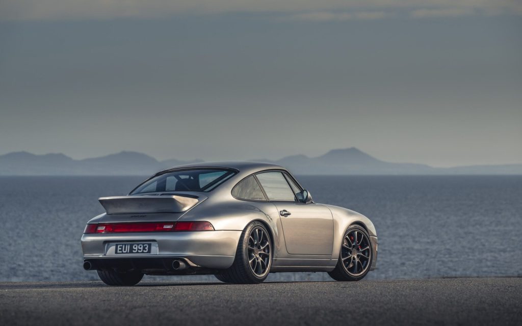 Paul Stephens Autoart Porsche 993R rear three quarter view by ocean