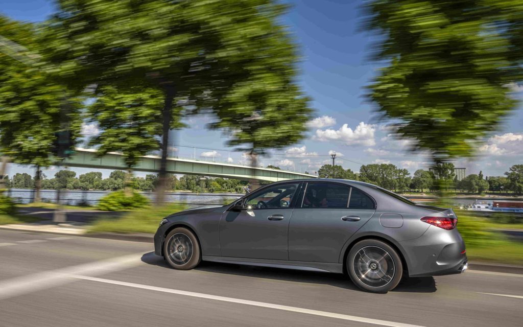 Mercedes-Benz C 350 e side view driving