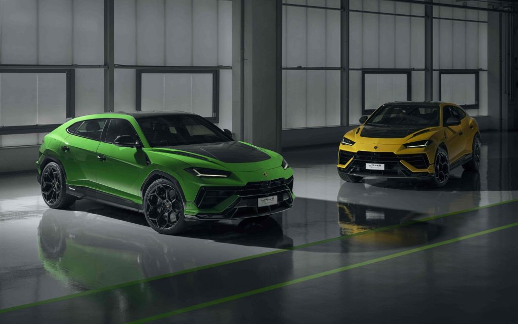Two Lamborghini Urus Performantes parked next to each other quarter view