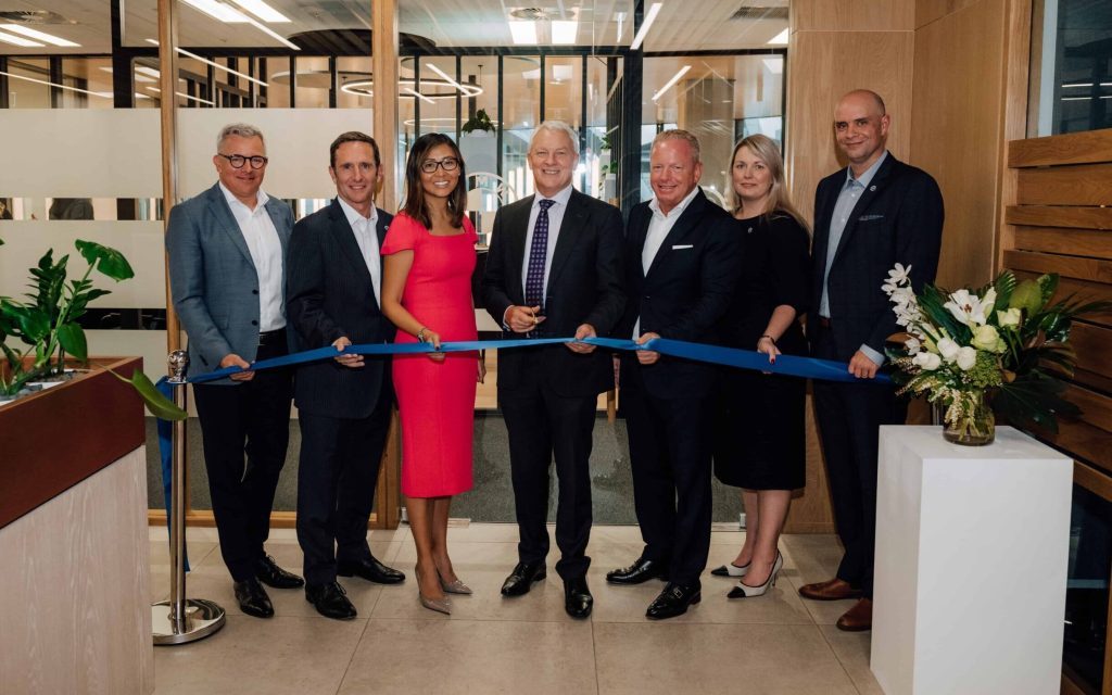Auckland mayor Phil Goff standing with BMW Group NZ leaders