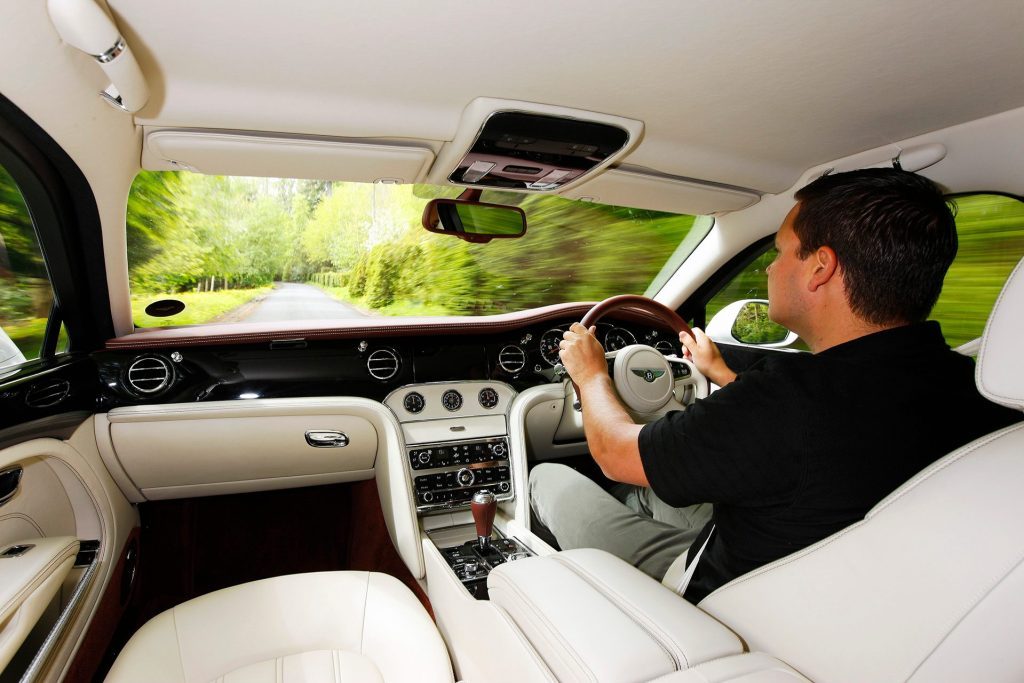 2010 Bentley Mulsanne with man driving