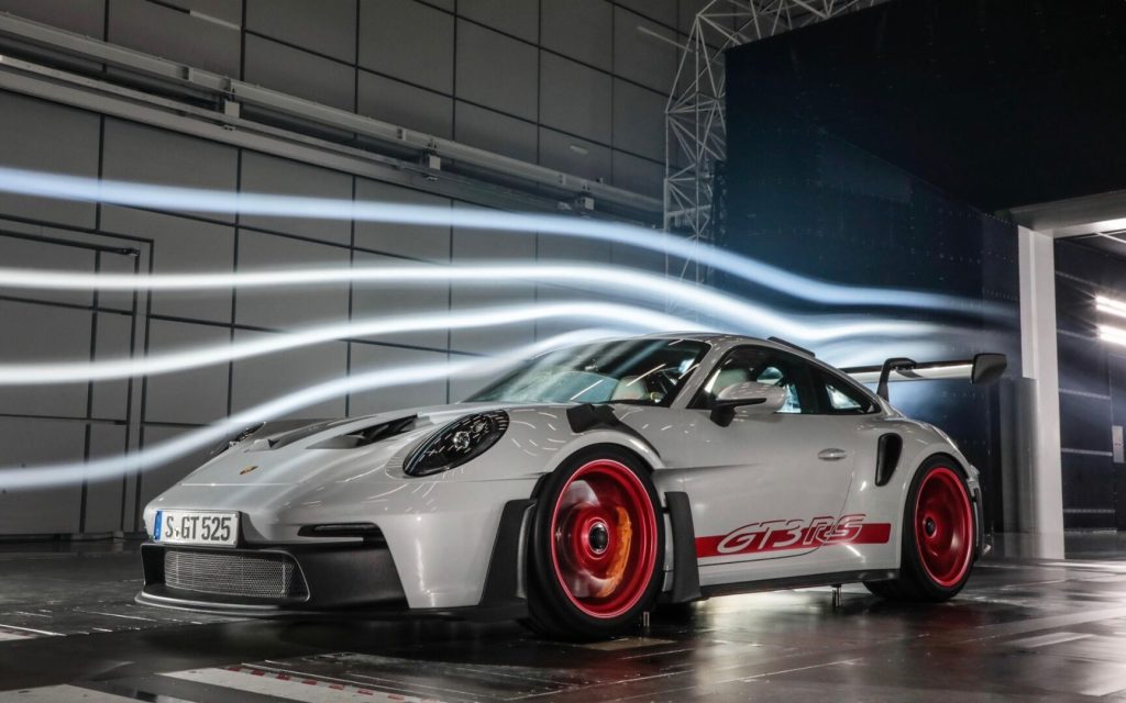 Porsche 911 GT3 RS 992-generation front three quarter view in wind tunnel