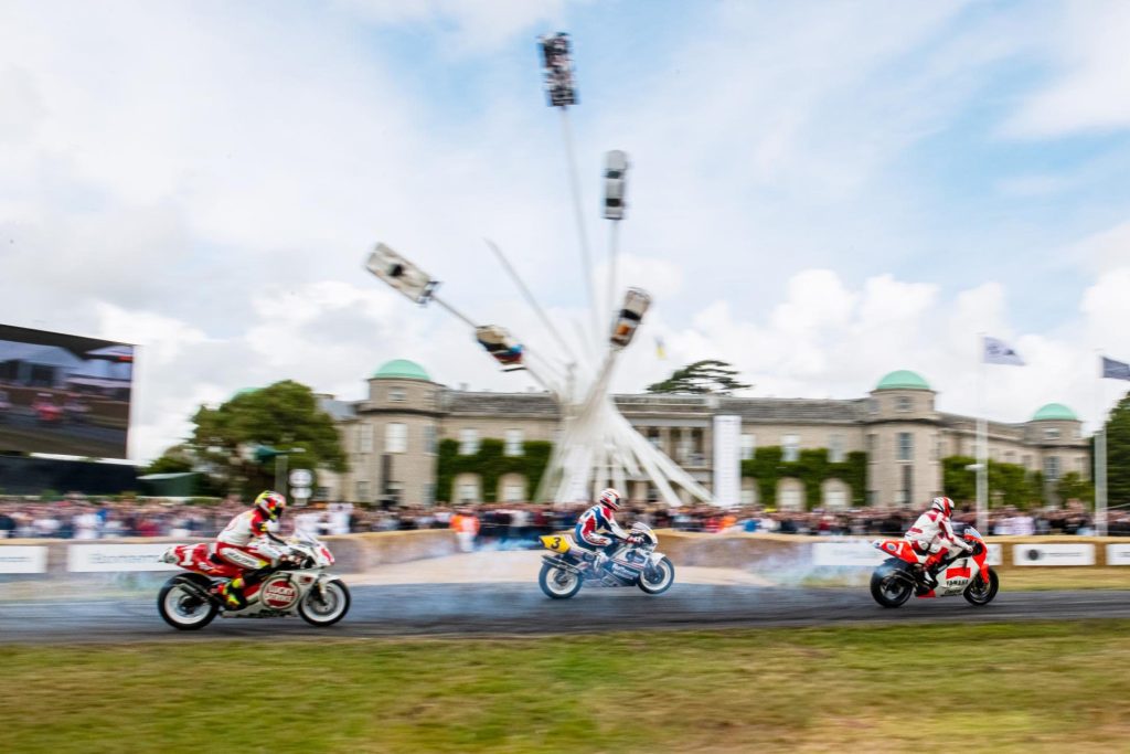2022 Goodwood Festival of Speed motorcycles riding past sculpture