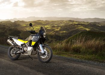 2022 Husqvarna Norden 901 on hilltop with sun setting