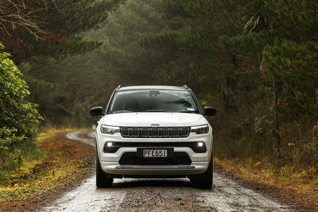 2022 Jeep Compass S-Limited parked in rainy forest