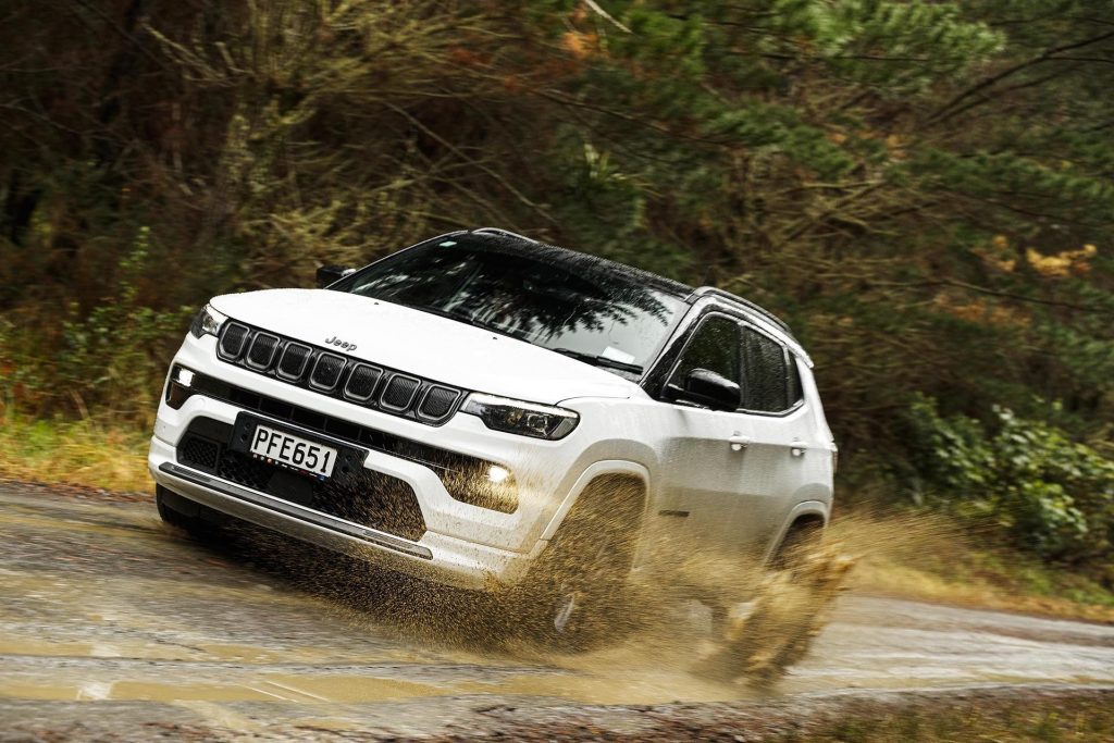 2022 Jeep Compass S-Limited splashing through puddle