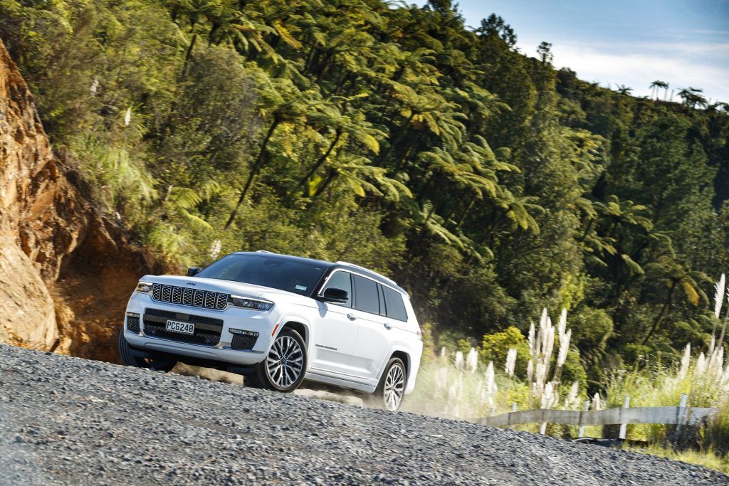 2022 Jeep Grand Cherokee L Summit Reserve driving on gravel