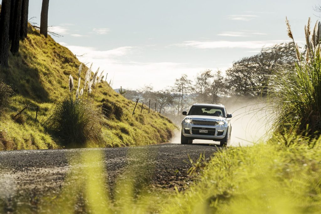 2022 Jeep Grand Cherokee L Summit Reserve backlit gravel action