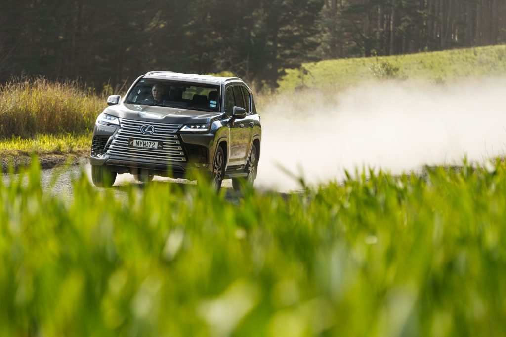 Lexus LX 500d driving on gravel road