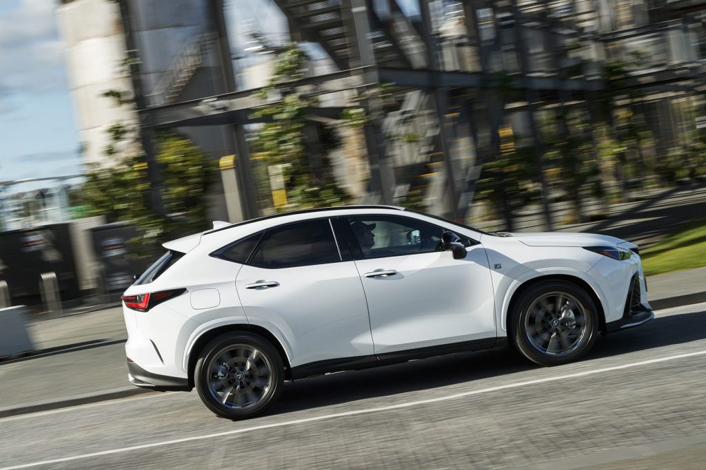 2022 Lexus NX 450h+ F Sport driving through city