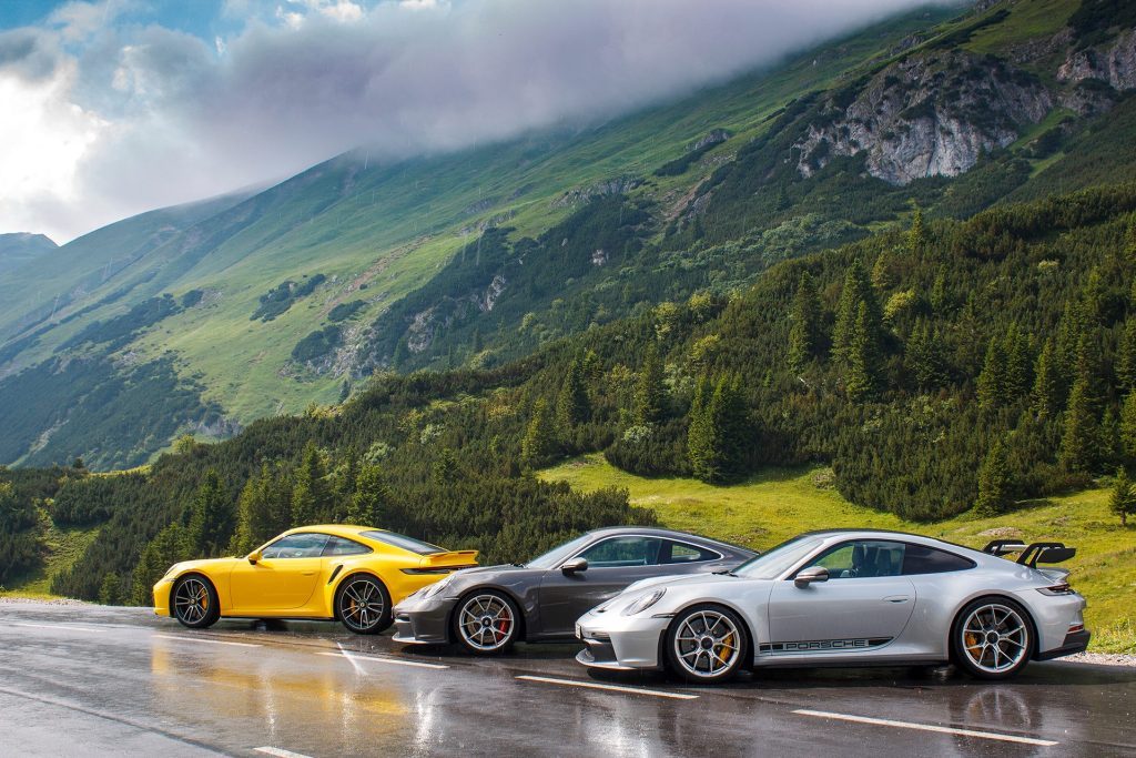 2022 Porsche 911 GT3 Austrian road trip in a line with mountains in background