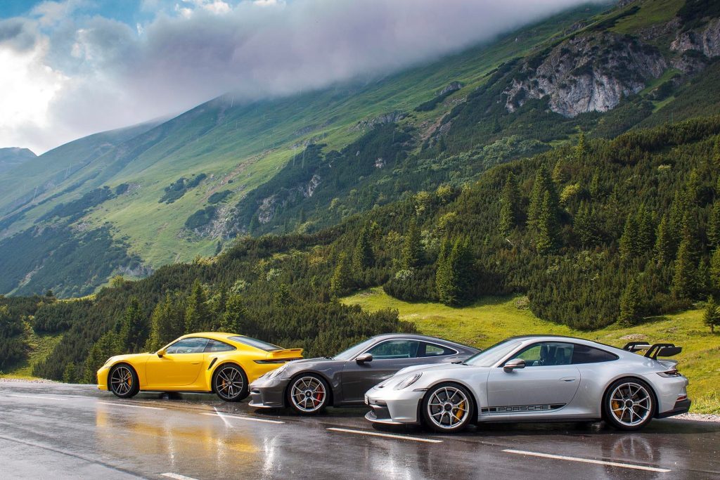 Porsche 911 GT3 and 911 Turbo S on top of a hill
