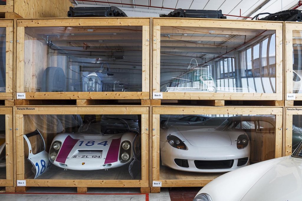 Porsche's Secret Garage 906 aand Carerra GT in packing crates