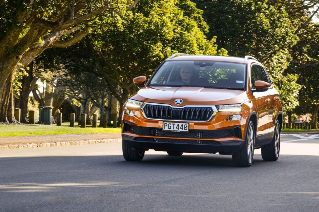 Skoda Karoq Style driving past trees