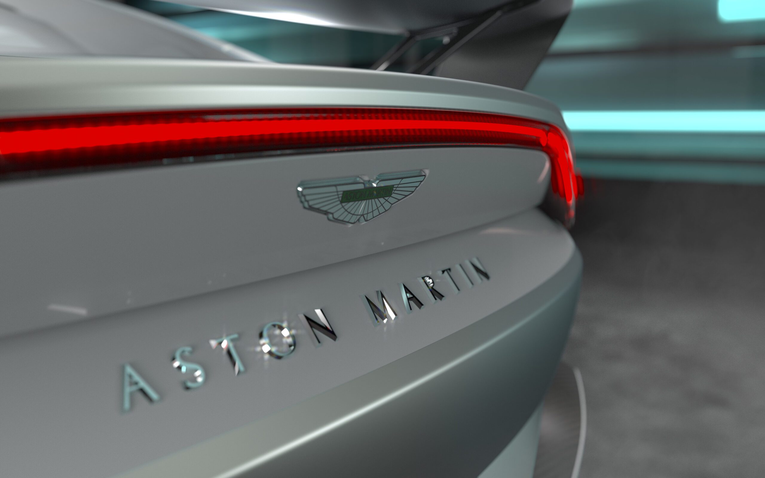 Aston Martin V12 Vantage rear badge close up view