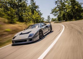 One-off Ferrari F40 Competizione front three quarter view driving around corner