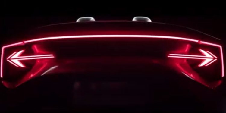 MG electric roadster tail lights illuminated in darl