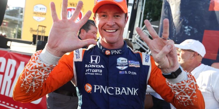 Scott Dixon holding up hands to show IndyCar wins at Nashville