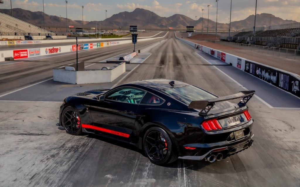 Shelby Mustang GT500 Code Red rear three quarter view at drag strip