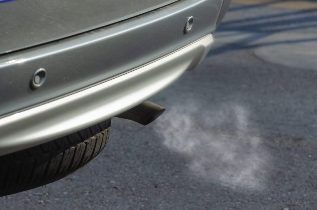 Car exhaust with fumes