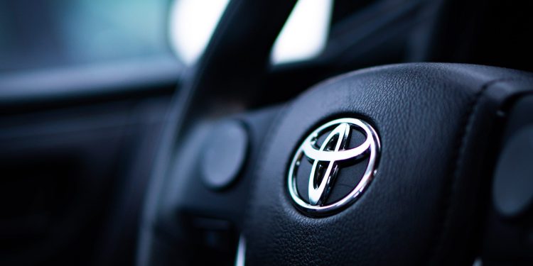 Toyota logo badge on steering wheel