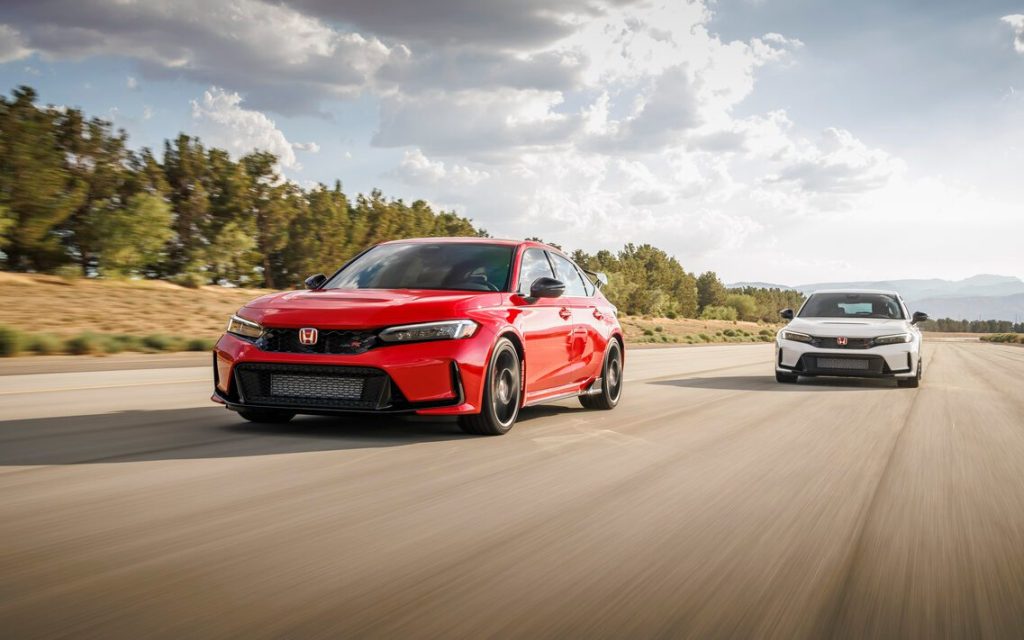 Two Honda Civic Type Rs driving on track front view