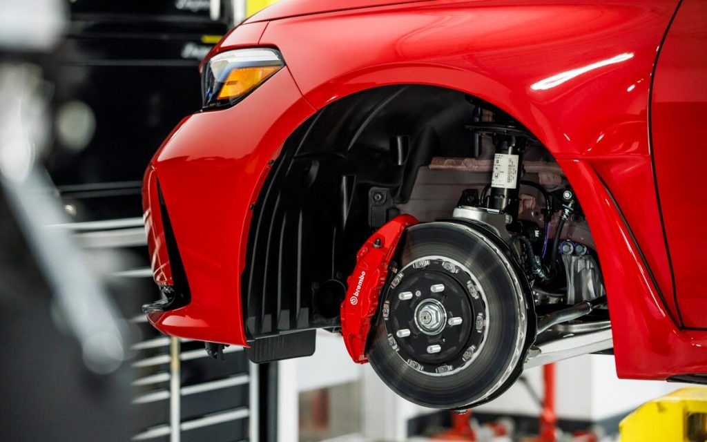 Honda Civic Type R front brake components close up view