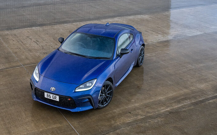 Toyota GR86 blue top down front three quarter view