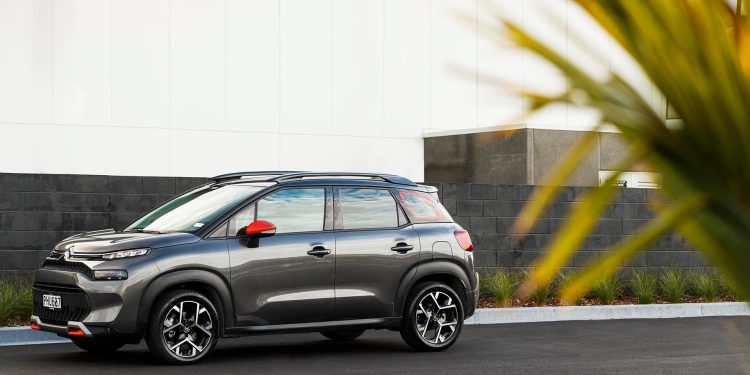 2022 Citroen C3 Aircross Shine parked in front of dark wall