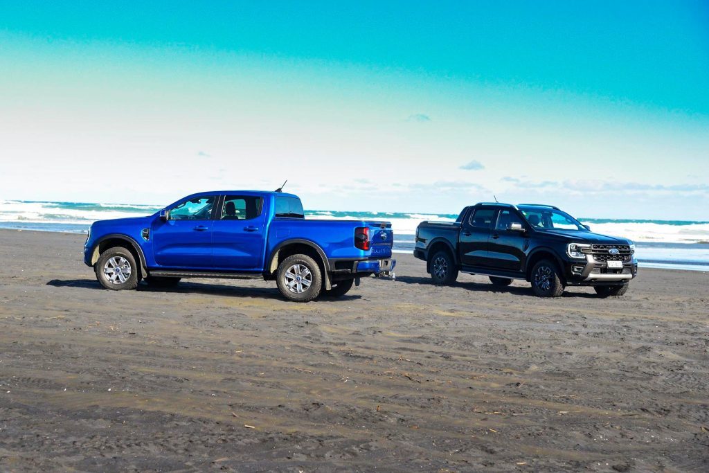 2022 Ford Ranger Wildtrak V6 vs Ford Ranger XLT 4x4 parked on beach