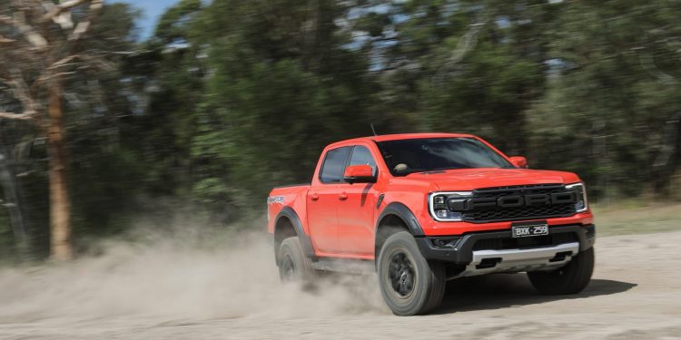 2022 Ford Ranger Raptor driving sideways on gravel