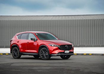 2022 Mazda CX-5 SP25T parked in front of corrugated iron wall