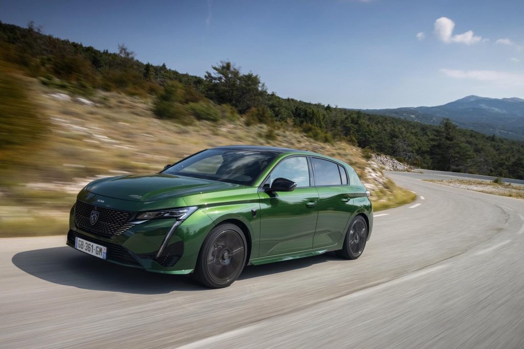 2022 Peugeot 308 driving on twisty road