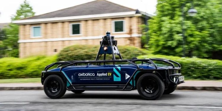 Applied EV off-road autonomous vehicle side view driving