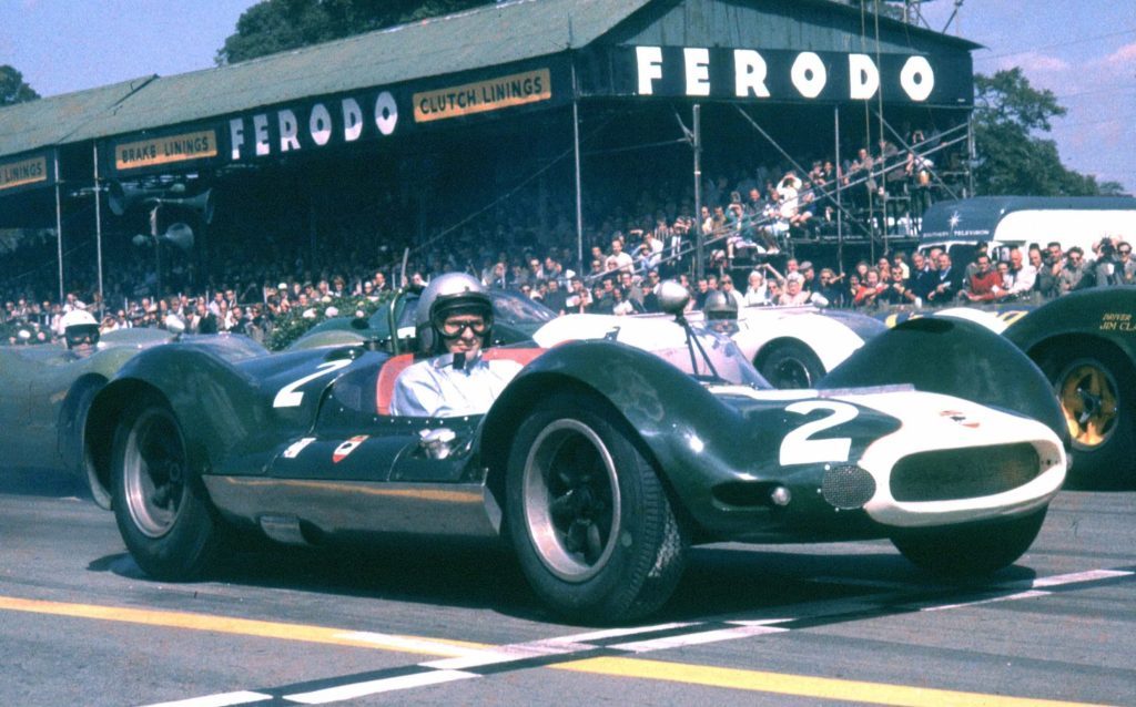 Cooper-Zerex-Oldsmobile on race track with Bruce McLaren