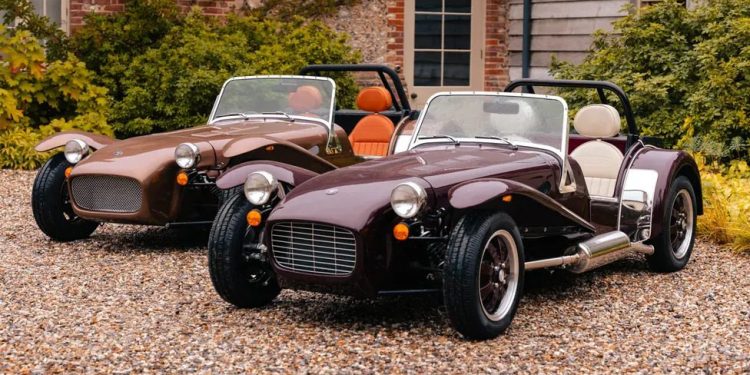Two Caterham Super Sevens parked next to each other front three quarter view