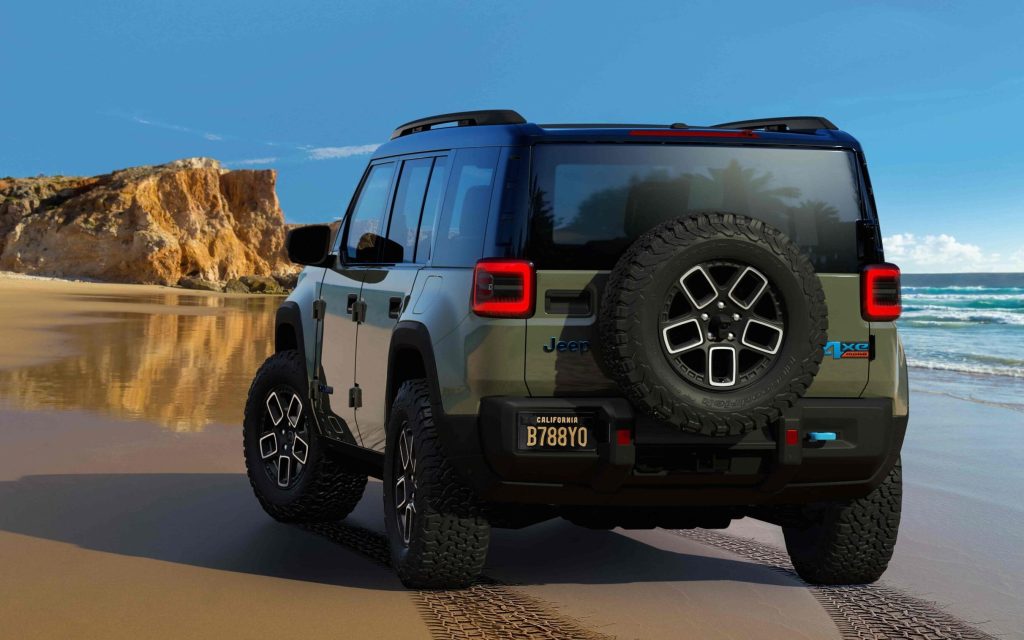 Jeep Recon 4xe SUV rear view on beach