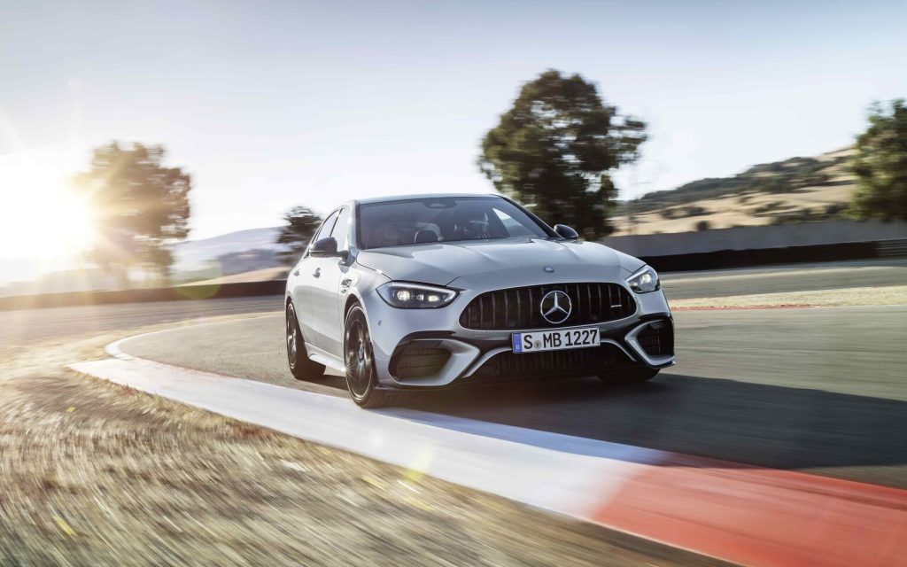Mercedes-AMG C 63 E Performance front three quarter view driving on track