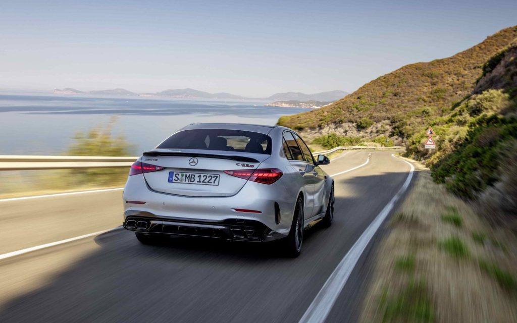 Mercedes-AMG C 63 E Performance rear three quarter view driving on road