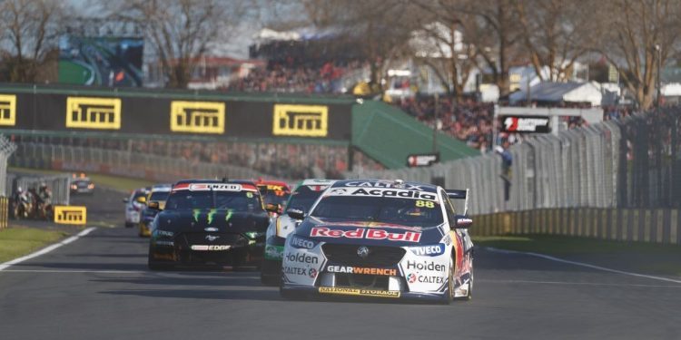 Holden Commodore Supercar leading race pack at Pukekohe Park Raceway front view