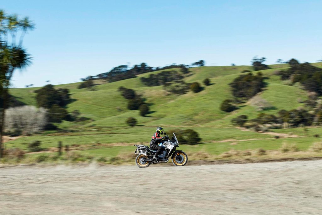 2022 CFMoto 800MT Touring riding past hills