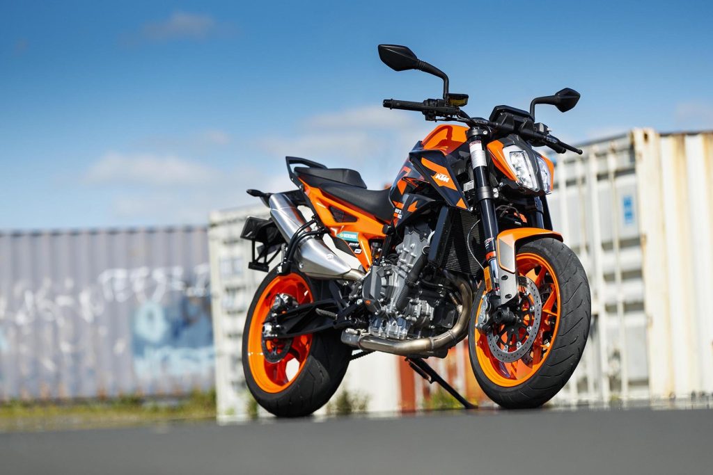 KTM Duke 890 in front of containers