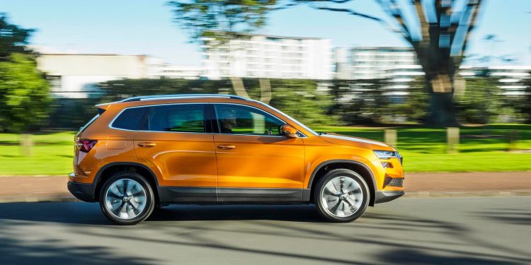 2022 Skoda Karoq TSI 110 Style driving past trees